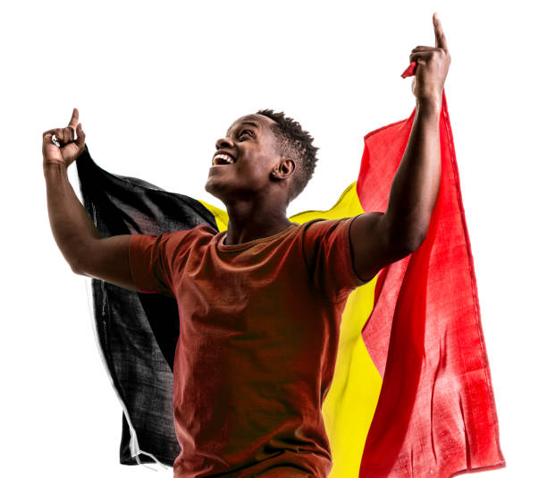 Belgian afro fan holding the national flag Sport collection belgian culture stock pictures, royalty-free photos & images