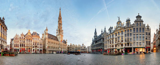 Belgium - Grand Place in Brussels, panoramic view before sunrise, nobody stock photo