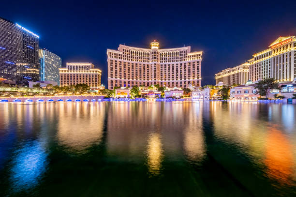 Bellagio + Cosmopolitan + caesars palace at night - Las Vegas stock photo