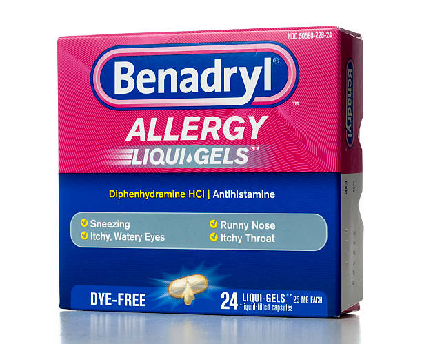 Benadryl Allergy Liqui-Gels "Miami, USA - March 13, 2012: Benadryl Allergy 24 Liqui-Gels capsules. Benadryl brand is marketed by Johnson & Johnson subsidiary McNeil Consumer Healthcare." antihistamine stock pictures, royalty-free photos & images