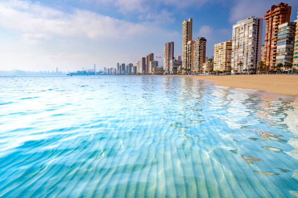 Benidorm Levante beach clar turquoise water in Alicante Spain Benidorm Levante beach clear turquoise water in Alicante of Spain costa blanca stock pictures, royalty-free photos & images