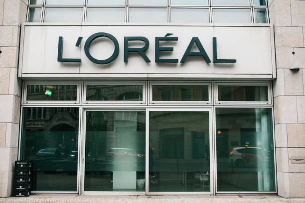 Berlin, Germany 15 February 2018: French company and leader of world market of perfumery and cosmetics. Office of company or corporation and world business and trade. Berlin, Germany 15 February 2018: French company and leader of world market of perfumery and cosmetics. Office of company or corporation and world business and trade loreal stock pictures, royalty-free photos & images
