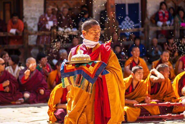 Bhutan monk performs religious ceremony stock photo