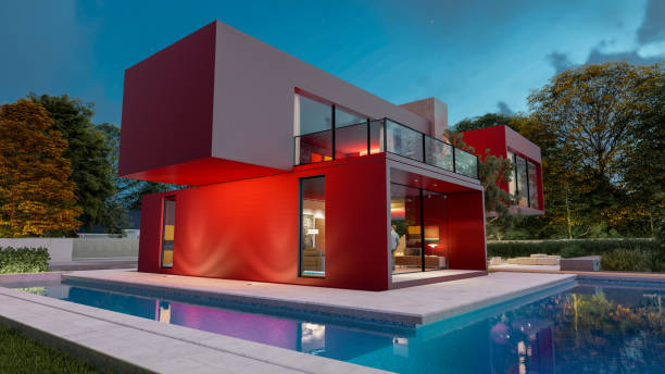 big contemporary red villa with pool and garden in the evening - planear obras vermelho imagens e fotografias de stock
