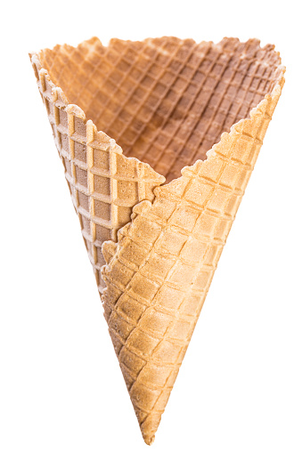 Food and drink - ice cream: Big empty crispy ice cream waffle cone isolated on white background