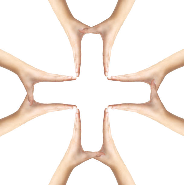 Big Medical Cross symbol from hands isolated Big Medical Cross symbol from hands isolated plus sign photos stock pictures, royalty-free photos & images