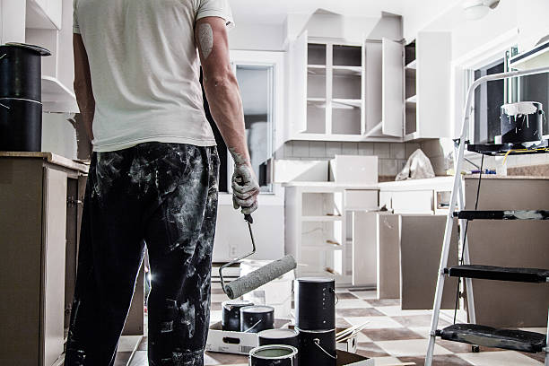 Big Painting Job ! Mess of All kind of Painting Equipment in the Kitchen and Discouraged Man painting activity stock pictures, royalty-free photos & images