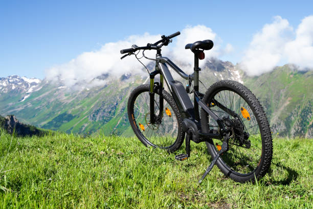 E Bike In Austria. Ebike Cycling E Bike In Austria. Ebike Cycling In Mountains electric bike stock pictures, royalty-free photos & images