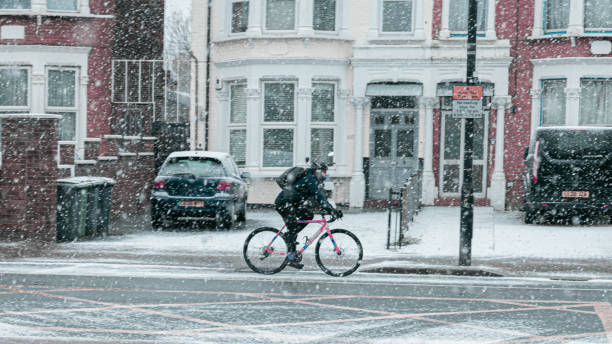 Biker in the snow. North London stock photo