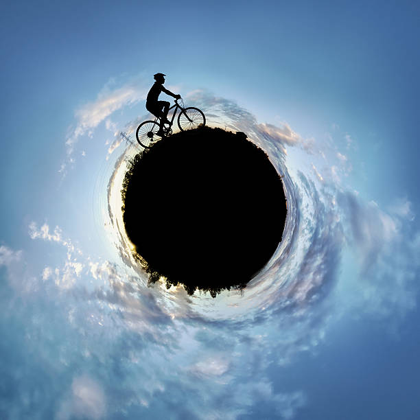 Biker on a Small Planet stock photo
