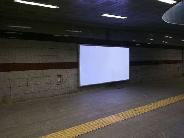 billboard inside an underground station stock photo