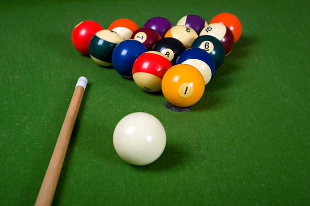 Billiards of Pool Billiards or pool table with balls and a cue stick cue ball stock pictures, royalty-free photos & images