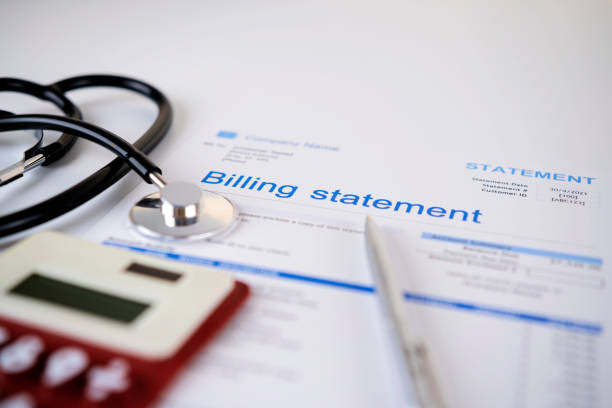 billing statement for for medical service in doctor's office background stock photo
