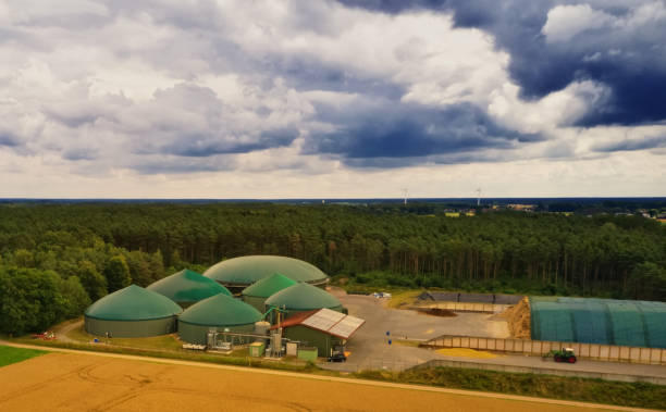 biogas plant with silage piles and digesters for the production of methane stock photo