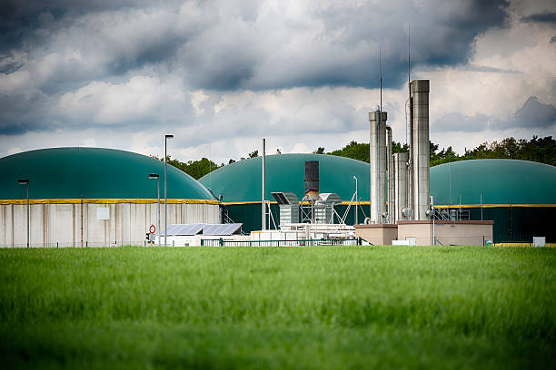 Biomass energy plant under a great cloudscape Energiewende Biogas stock photo