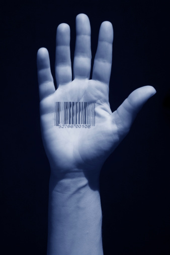 Hand with barcode tatoo.