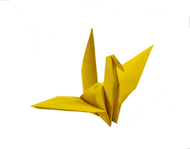 uccello di carta su sfondo bianco - origami foto e immagini stock