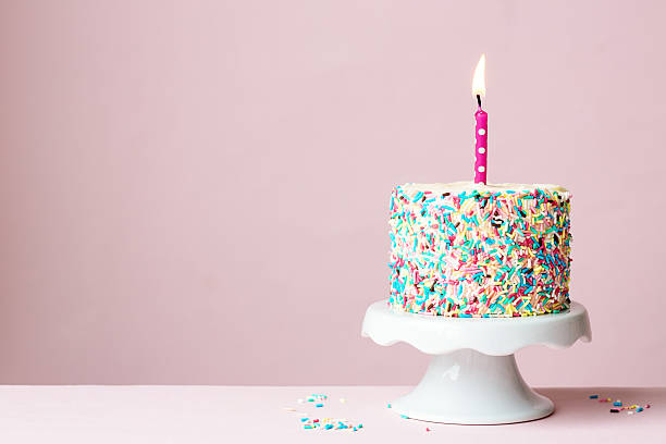 Birthday cake Birthday cake with one candle birthday cake stock pictures, royalty-free photos & images