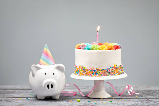 Birthday Money Concept with Rainbow Iced Cake stock photo