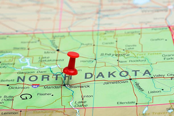 Bismarck pinned on a map of USA Photo of pinned Bismarck on a map of USA. May be used as illustration for traveling theme. north dakota stock pictures, royalty-free photos & images