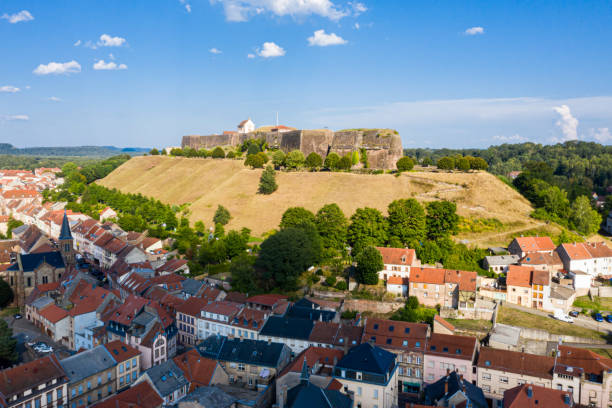 Bitche historical town center and star shaped bastions and outworks of hilltop Citadelle de Bitche, medieval fortress and stronghold near German border in Moselle department, Grand Est, France stock photo