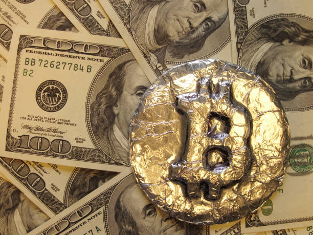 Bitcoin on dollar banknotes