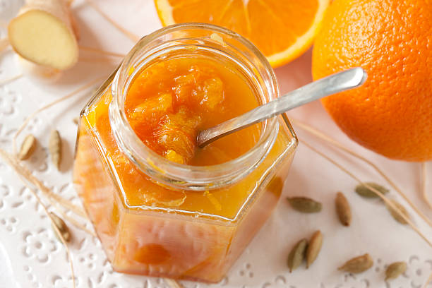 Bitter orange jam "Home made sweet and bitter orange jam made from: orange, orange peel, sugar, cardamom, ginger." marmalade stock pictures, royalty-free photos & images
