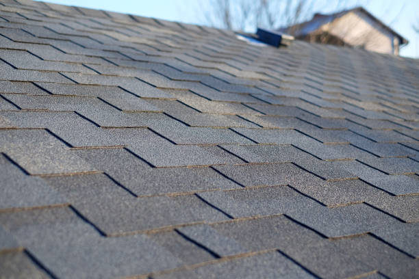 Bitumen tile roof. Roof Shingles - Roofing. Close up view on Asphalt Roofing Shingles . Bitumen tile roof. Roof Shingles - Roofing. Close up view on Asphalt Roofing Shingles . shingles stock pictures, royalty-free photos & images