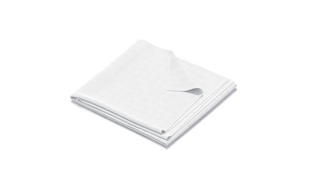 Blaank white folded fabric with deferred corner mockup, isolated stock photo