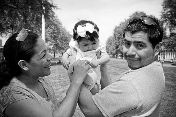 Black and White Hispanic Family Outside with Baby  mexican culture photos stock pictures, royalty-free photos & images