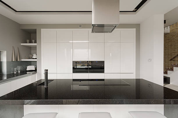 Black and white kitchen interior Picture of black and white kitchen interior granitic stock pictures, royalty-free photos & images