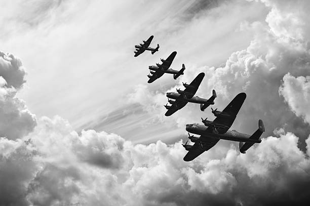 Black and white retro image Battle of Britain WW2 airplanes Black and white retro image of Lancaster bombers from Battle of Britain in World War Two 20th century stock pictures, royalty-free photos & images