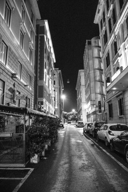 Black and white street Photography :  Empty Street in the heart of ROME, Italy stock photo