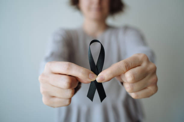 Black awareness ribbon stock photo