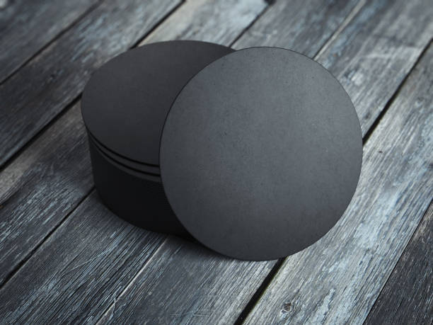 Black beverage coasters. 3d rendering Black beverage coasters on the wooden floor. 3d rendering coaster stock pictures, royalty-free photos & images