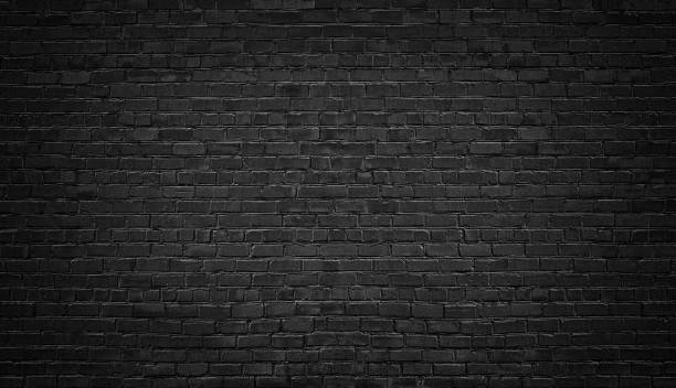 黒レンガの壁の背景。テクスチャ暗い石積み - 黒　背景 ストックフォトと画像