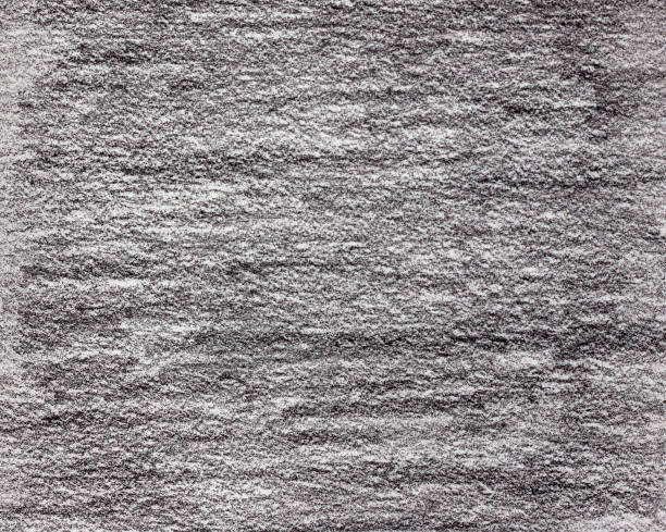 Black charcoal pencil strokes on art paper stock photo