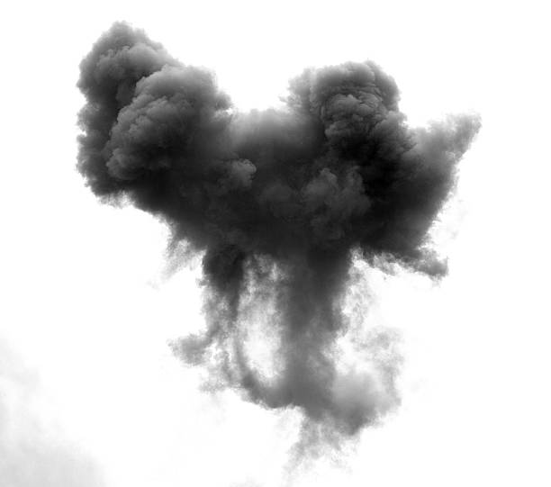 black cloud caused by an explosion of a bomb stock photo