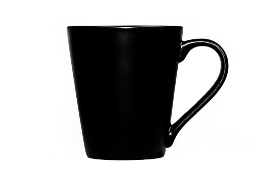 Black coffee cup isolated on a white background, high key silhouette, abstract conceptual image. Black and white mug.