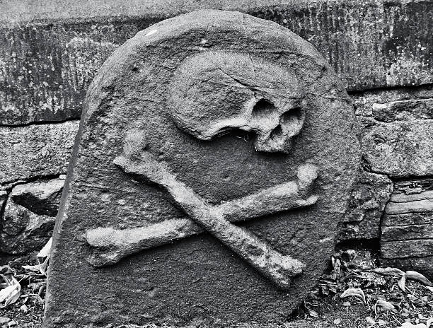 Black death Symbol on a grave of someone who died by the plague. Scotland. bubonic plague photos stock pictures, royalty-free photos & images