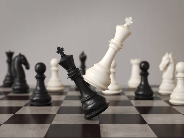 black defeats white king at chess Challenge stock photo