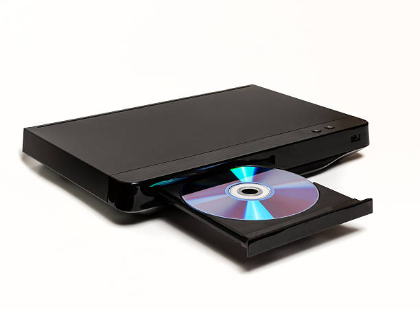 Black DVD/CD player with open tray and CD disk isolated stock photo