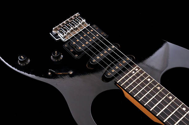 black electiric guitar stock photo