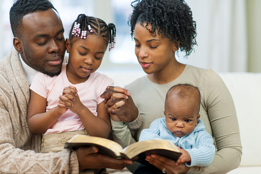 Black Family Bible Studying Stock Photo - Download Image Now - iStock