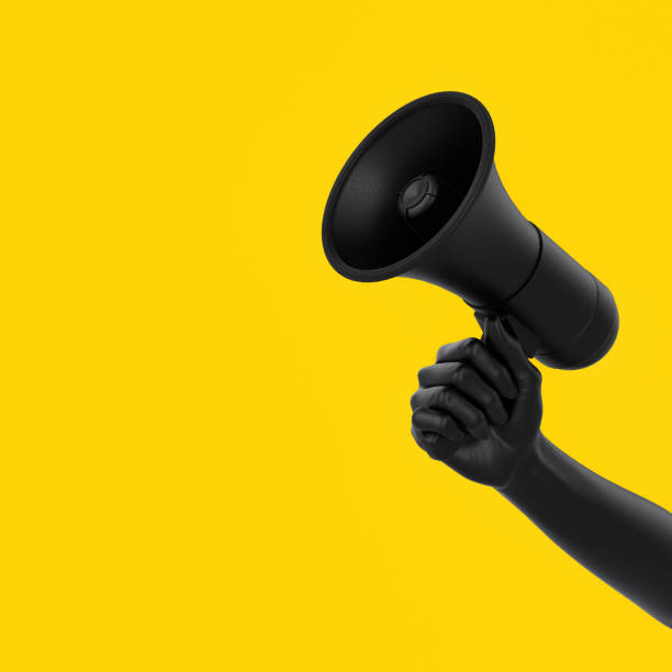 Black hand holding Megaphone on yellow background. Isolated loudspeaker announcement and sale creative banner concept. 3d rendering. Black hand holding Megaphone on yellow background. Isolated loudspeaker announcement and sale creative banner concept. 3d rendering. megaphone stock pictures, royalty-free photos & images