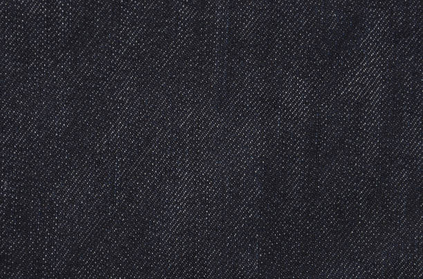 Black jeans background stock photo