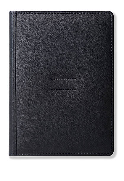 Black leather business diary isolated stock photo