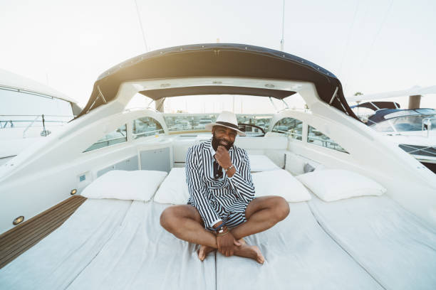 black man on yacht