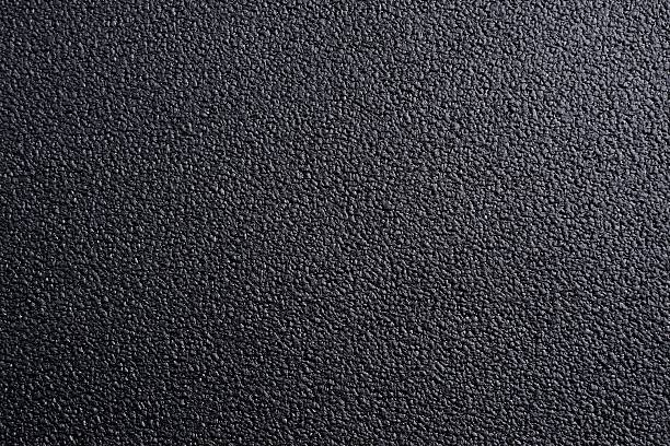 alfombrilla antideslizante negra - desigual con textura fotografías e imágenes de stock