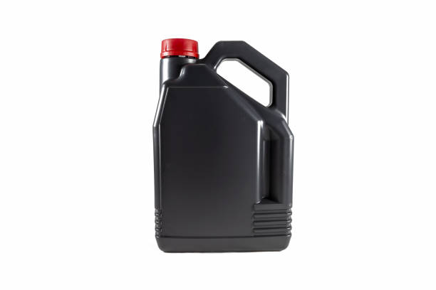 Black plastic motor oil canister 5 litres. Isolated on white background stock photo
